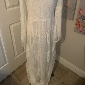 Boho new w/tags wedding dress, slight pull apart…can be easily sewn, size s/m
